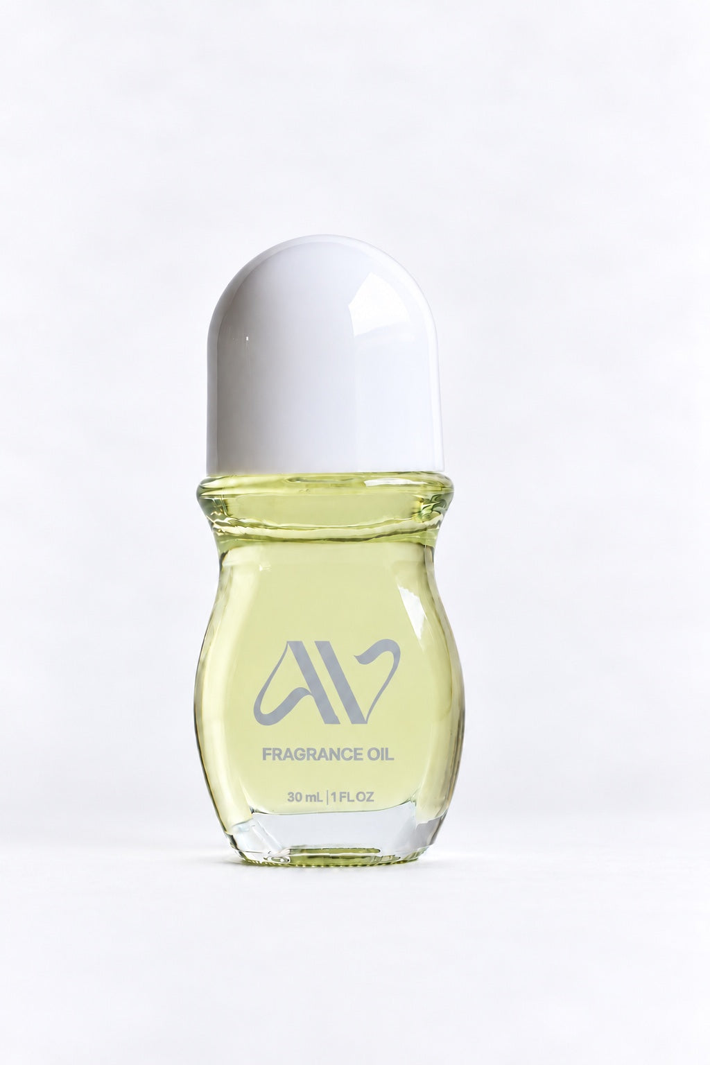 Auravlla pale yellow fragrance oil bottle