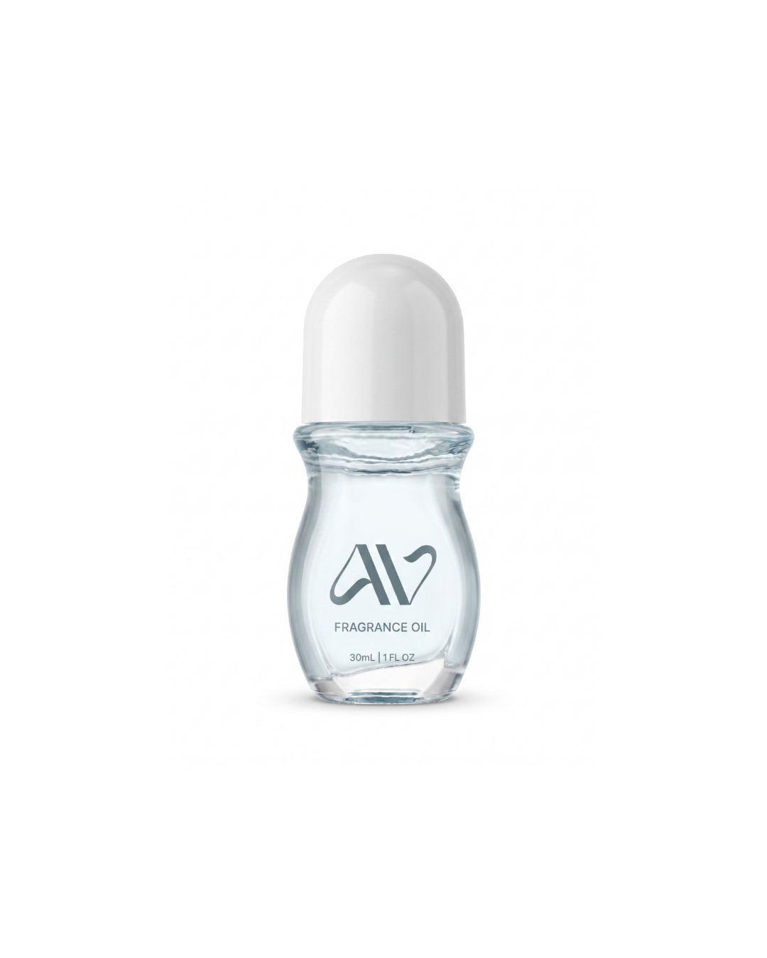Auravlla Treasure Beach fragrance oil in a clear glass roll-on bottle with a white cap against a white background.